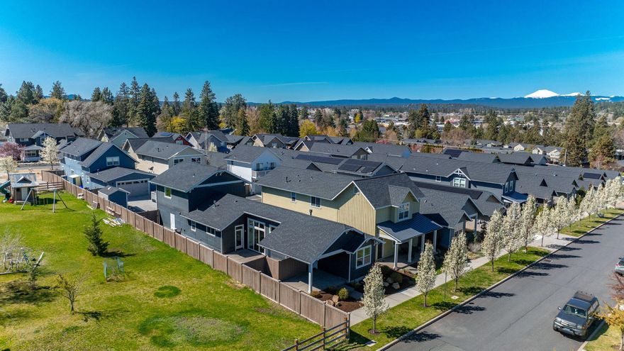 Welcome to your new home or next investment- a beautifully maintained, like-new single-level home in the heart of Midtown Bend. This light-filled 2-bedroom gem features soaring ceilings, an open and efficient layout, with a fresh, modern feel throughout. Crisp kitchen features include quartz countertops, SS Kitchenaid appliance package and ample storgage. The home borders a neighboring property on over ¾ of an acre, creating a rare sense of space and privacy in the midst of this vibrant neighborhood. What really sets this property apart is the versatile ADU - perfect for multi-generational living, a separate home office, or a fantastic income-generating investment. Whether you're looking to live, work, or earn, this setup checks all the boxes. Located just blocks from Orchard Park, Hollinshead Park, Midtown Yacht Club, and so much more, you'll love the convenience of this thriving neighborhood. A unique blend of comfort, flexability, and location- this opportunity is not to be missed!