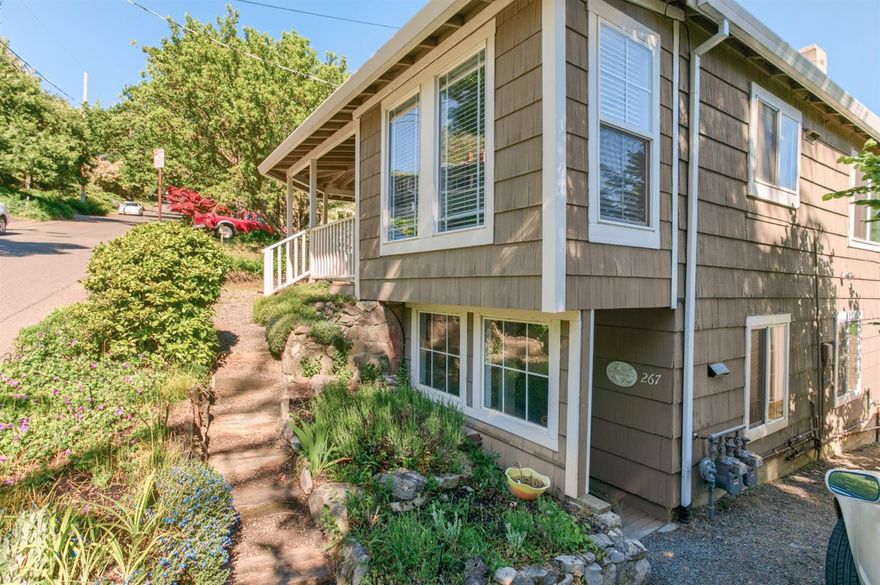 Amazing Duplex with views! This duplex has been beautifully updated and includes two, one bedroom, one bath units; one on each level. These are located on a large R-2 lot with room to grow. Simply stunning views from both levels and charm galore! The home has been updated with newer windows, roof, kitchens, decks, heating and so much more. This is a truly enchanting home with a rental unit downstairs.