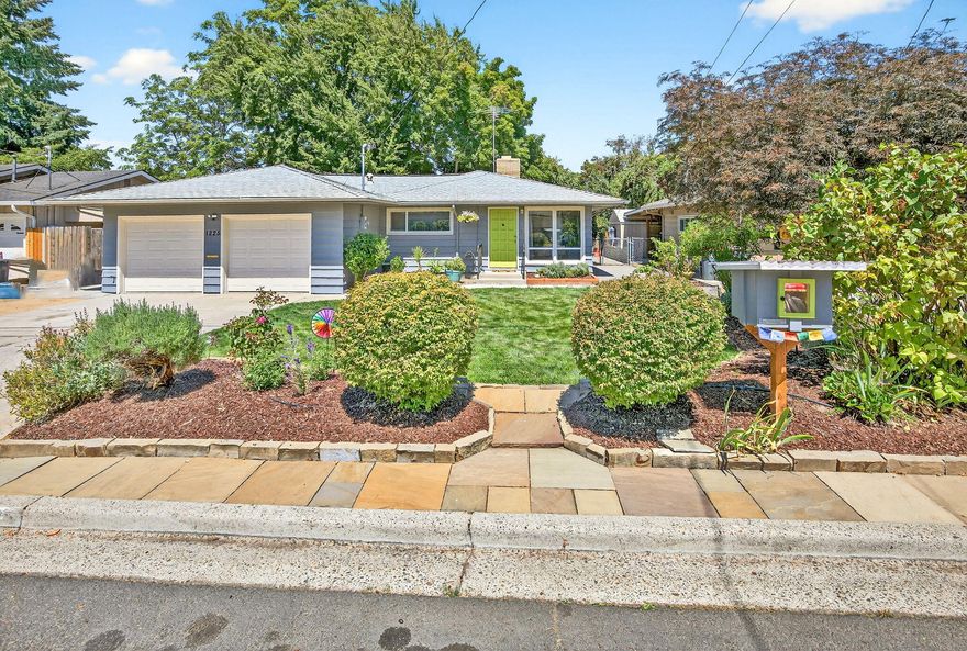 Charming 4 bedroom, 2 bath home in the heart of Old East Medford.  This inviting property features real hardwood floors, a cozy corner wood burning fireplace, and a beautifully updated kitchen and baths.  The private back yard is surrounded by mature trees and includes an above ground pool, hot tub, whimsical playhouse, and storage shed.  Out front, enjoy a super active tiny library that adds to the home's community charm.  A finished 2 car garage & timeless character thru-out make this a rare find in a highly sought out neighborhood.