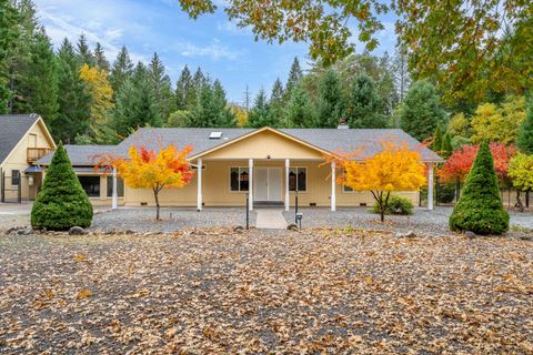 Photo of 335 Cornett Lane, Cave Junction, OR 97523 (MLS # 220211292)