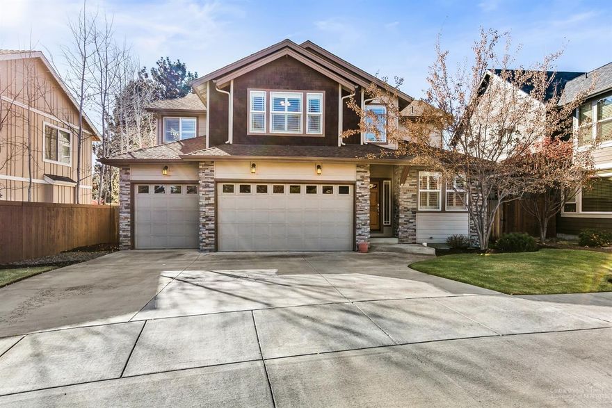 Quality home in desirable, well-maintained SE neighborhood, nestled among old-growth trees. Quick access to the highway as well as many other amenities puts this property in a quintessential Central Oregon location. This one-owner, impeccably maintained second home has been lightly lived-in and remains in like-new condition! Open floor plan allows for the perfect flow between the living and dining areas-including outdoor access to the patio and fully fenced, spacious, & landscaped back yard-with a bedroom, that could be also be used as an office, on the main level. Upstairs offers a large bonus/loft space that is ideal for a second living space or entertainment area. Incredible master suite includes vaulted ceilings, massive walk-in closet, double vanity, and luxurious soaking tub. No upgrades or features were overlooked- from the stunning exterior stonework and over sized 3-car garage to the generously-sized bedrooms and granite kitchen counter tops. Truly an impressive property!