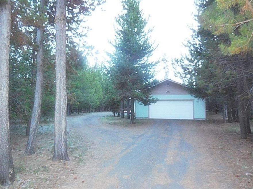 Charming, well maintained home by Deschutes River & community boat launch featuring Great Rm floor plan overlooking spacious & private backyard. Set back,treed lot for privacy. Community water & sewer & paved roads. Vaulted ceilings in this 3 bdrm/2 ba home w/nice master suite, utility area & workshop area in oversized garage w/addl breezeway off front porch entrance. Landscaped front/side yard. Ready for your personal touches. Neutral finishes & flooring. Great, 24ftx10ft deck off kitchen.