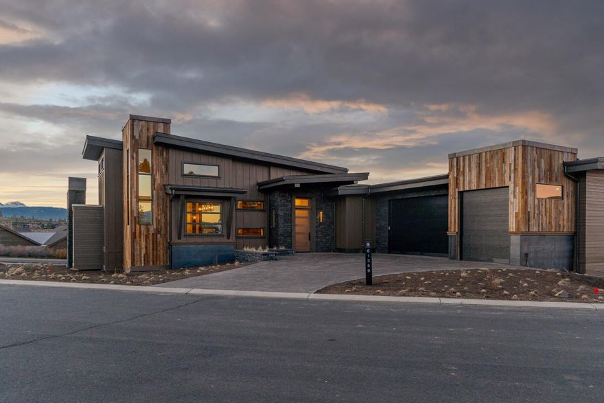 Newly finished in Tetherow, this 3,665 sf custom home was thoughtfully designed and executed with pride and exceptional attention to detail. Features include vaulted ceilings, open kitchen, great room floorplan, 3 bedrooms on the main and bonus w/4th bedroom or ~650 sf ADU downstairs, large outdoor deck perfect for entertaining with a custom steel firepit, built in BBQ, outdoor heater, spa hook up and projection screen. Exposed Douglas Fir beams wrapped in steel, box matched custom cabinetry, reclaimed Kentucky barn wood, French oak floors, steel accents and fireplace, and super cool lighting are just a few of the touches featured throughout. This house rocks with insane Cascade views, 3 car garage with Sprinter van parking and is located close to the club house, Tetherow Sport and owner pool. Tetherow is conveniently located off of Century Drive with easy access to Mt. Bachelor, trails, the Deschutes River, Downtown, Old Mill – all the good stuff Bend has to offer.