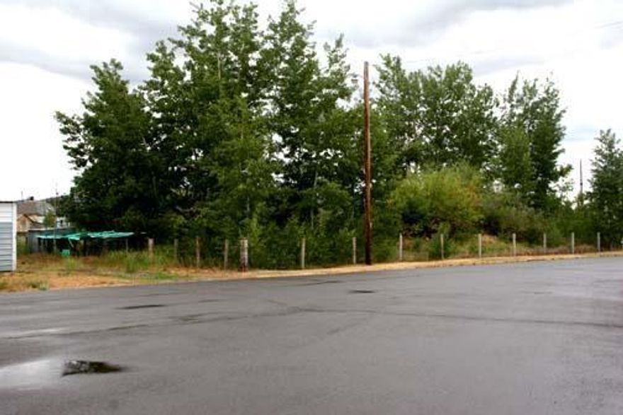 Park Like Setting With Mature Trees And Shrubs. Pond. Storage Shed. Fenced. Zoning Is Commercial. Being Used For Recreation. A Nice Park In The City Of Dorris.