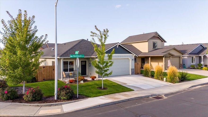 Beautiful single-level home in the desirable Waverly neighborhood, a 55+ community. This well-maintained residence features an open floor plan with vaulted ceilings, a spacious primary suite, and abundant natural light throughout. The living room offers a cozy gas fireplace, while the kitchen showcases quartz counters, knotty-pine cabinetry, a large pantry, and a sliding glass door that opens to a private back patio. Enjoy year-round comfort with a forced-air gas furnace and A/C unit. With beautifully maintained landscaping, a fenced yard, and the added privacy of a corner lot, this home truly has it all.