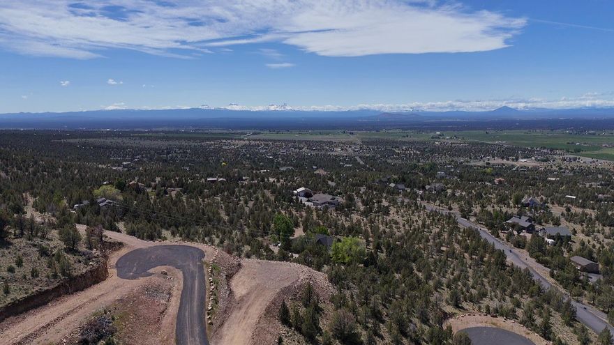 This exceptional lot in Powell Butte isn't just a place to build—it's the foundation for a truly one-of-a-kind home. Perched nearly 200 feet above the road, the homesite offers unmatched privacy and panoramic views stretching from Pilot Butte to the Ochoco National Forest. You'll experience the full splendor of Central Oregon's natural beauty, right from your doorstep.

The lot comes ready with a completed driveway, power, and Avion water already to the site. Plus, a private easement provides direct access to public lands just south of the property—perfect for adventure and exploration.

Ready to start your forever home? Contact us today to walk the land and take in the view.