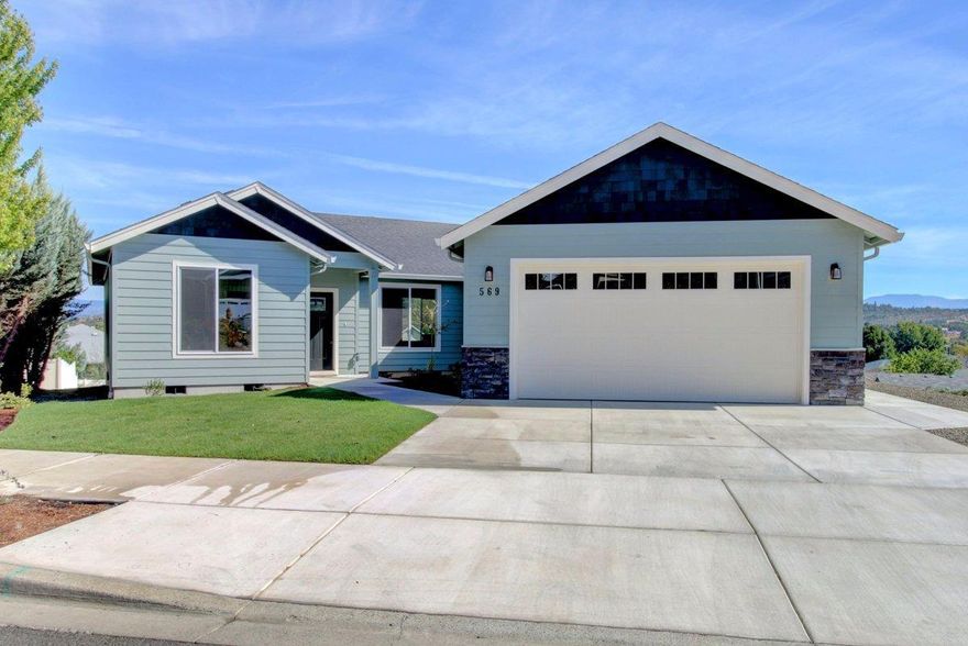 Stunning, Brand New Custom-Built Home, Built with Pride by Richard T. Brink Homebuilder, Inc. Incredible views * Huge .25-acre lot Large enough for in-ground swimming pool or shop * Wonderful split-bedroom floor plan w/1810 sq. ft. main level * Additional 394 sq. ft. bonus room downstairs perfect for daycare or pool table with slider glass door to back yard w/concrete patio wired for hot tub * So many upgrades & extras we couldn't begin to list them all. Some include: cabinets throughout, granite countertops + island, abundance of laminate flooring, Whirlpool stainless-steel appliances, carpet, lighting & plumbing fixtures, gas fireplace w/custom surround & blower, wood baseboards throughout, large laundry room with extra cabinets + much more. Huge master suite w/walk in closet & custom shelving, 2 sinks & walk-in shower. Outside, enjoy the views on the covered Timbertech view deck. Beautifully landscaped front yard w/timed sprinklers & 2-car finished garage. This is a must tour.