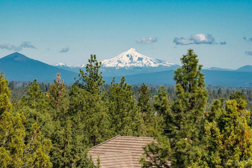 Elevated 1 acre homesite with sweeping views of the forest and spectacular Mt. Jefferson. North Rim is a gated community of fine custom homes where creative home design blends and balances with the native environment. Community amenities include paver walking paths throughout, park and tennis court, and the spectacular North Rim Lodge. Located within the city limits in NW Bend and just 3 miles to downtown. All city services, fiber optic option.