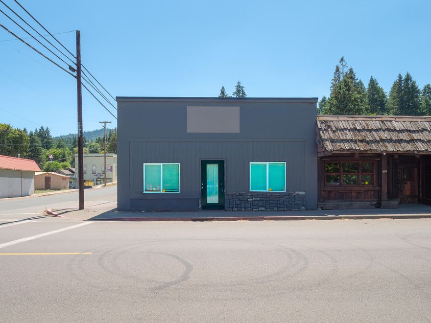 Commercial building located on a high visibility corner lot. Convenient street parking and good walk-up access. New membrane roof, heat pump for climate control. Commercial zoning allows many uses. Very affordable property taxes. Bring your business and ideas!