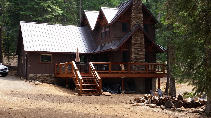 ONLY SOLD Rare opportunity to own a beautifully remodeled and spacious cabin on the EAST side of Lake of the Woods w/year round access off Dead Indian Memorial. Memories will be made in this cabin w/an addition in 2015, and  extensive remodeled in 2022, just up the hill from the lake. 3 ''bedrooms'' Large mudroom/arctic entry. Huge dining room w/slider to deck. Main floor ''bedroom'' w/new sheetrock/lighting/window. ALL NEW kitchen w/painted cabinets, appliances, under cabinet lighting, granite counters. Living room w/propane fireplace and slider to deck. Main floor full bath is ALL NEW w/full size stack washer/dryer, large vanity, storage and shower.  loft w/ceiling fans and room for multiple beds. Upstairs full bath is HUGE w/new shower/linen and vaulted ceiling. Second loft area/bunkhouse. New on-demand hot water, and ductless heat/air. Shared dock. NEW well shared w/2 cabins. Seller is a licensed realtor in OR