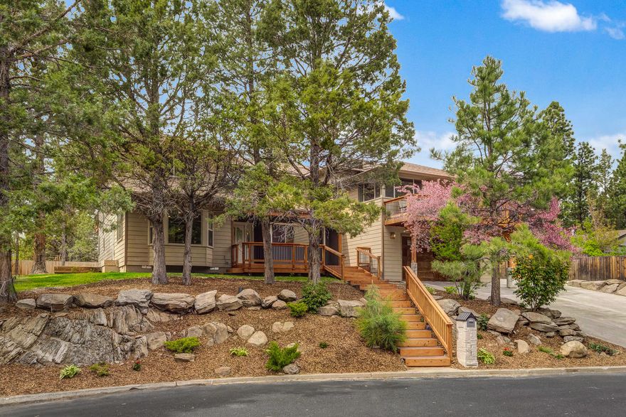 This 4224 s/f home in the coveted Valhalla Heights neighborhood has 6 bedrooms, 5 full baths, an office & has been almost fully renovated. Nestled in a private cul-de-sac on nearly 1/2 acre, w/peek a boo Cascade Mountain views, & wonderful outdoor environment for playing & entertaining. Main level great room floor plan, w/tall ceilings & wood beams opens to a contemporary kitchen w/custom slab granite counters, new stainless appliances & huge center island.  Large flex room ideal for formal dining or family room. Master bedroom & large office on the first floor. Open staircase leads to a lofted 2nd bonus room, huge second master & two beds w/Jack & Jill bath. Plus, one-bed Mother-in-Law quarters w/its own entry. Newer siding, furnace & roof. Lg. concrete pad adjacent to the 2-car garage is great for storage or RV parking. Large decks both upstairs & down bring the outside in. Lots of wonderful upgraded lighting inside & out. An exceptional value close to trails & downtown Bend!