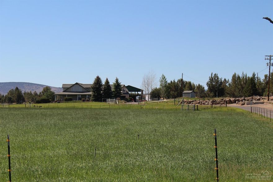 Backs up to BLM (Wilderness Badlands) Bend, Oregon is one of the greatest places in the West to live. This Beautiful Horse and Hay Farm on Dodds Road is the best place to own acreage in Bend, hands down. Come let us show you around this beautiful Home and Farm. Not only is the Farm located in a wonderful part of Oregon, The property has 3 RV pads 30amp, septic, water,  Horse Barn 7 Stalls, Tack Room & Wash Rack * 59.5 deeded acres * 38.4 acres irrigated with Central Oregon Irrigation District2.  Bedroom Apartment above garage * 2900 sq.ft. custom built home with open great room design.1849 sq. ft. 1st floor, 1051 sq.ft. 2nd floor & the atrium is 131 sq.ft with power & water. * living space totaling 5 Bedrooms & 3.5 Baths *Radiant floor heat *Detached garage *2 Pivots & 3 Wheelines Hunt Deer,Elk,Waterfowl