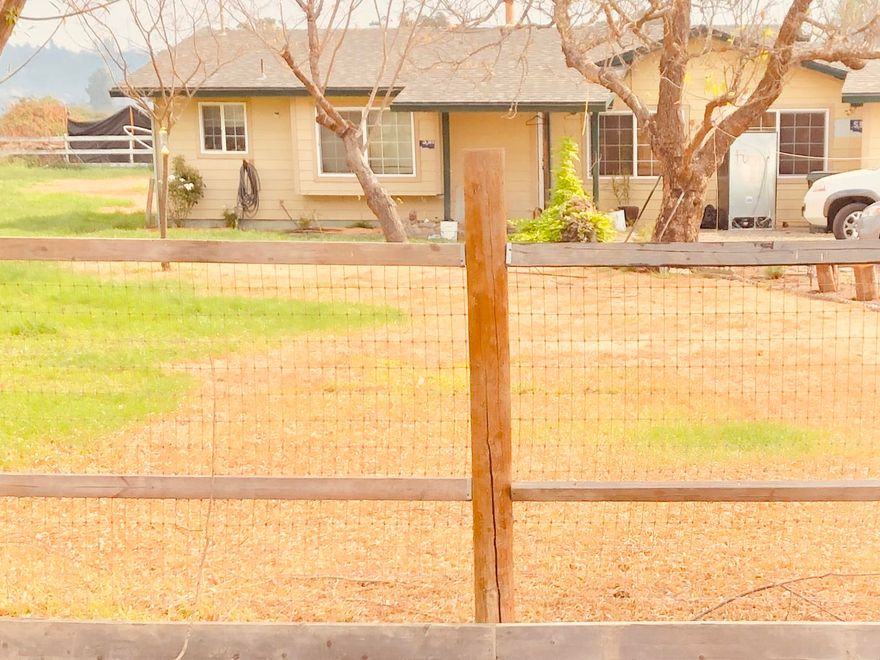 3 bedroom/1 bathroom, 1056 sq ft on just under 6 acres.  Zoned EFU, with approximately 2 acres with flood irrigation rights, thru EPID.  Plenty of water for the house and property, with two wells and holding tank.  Large pasture for live stock.  Plenty of room for RV and other toys.  There is a large barn with chicken coop as well as other sheds on property.  Fully fenced with pet fencing in front and livestock fencing in the rear. Property to be sold ''as-is''.