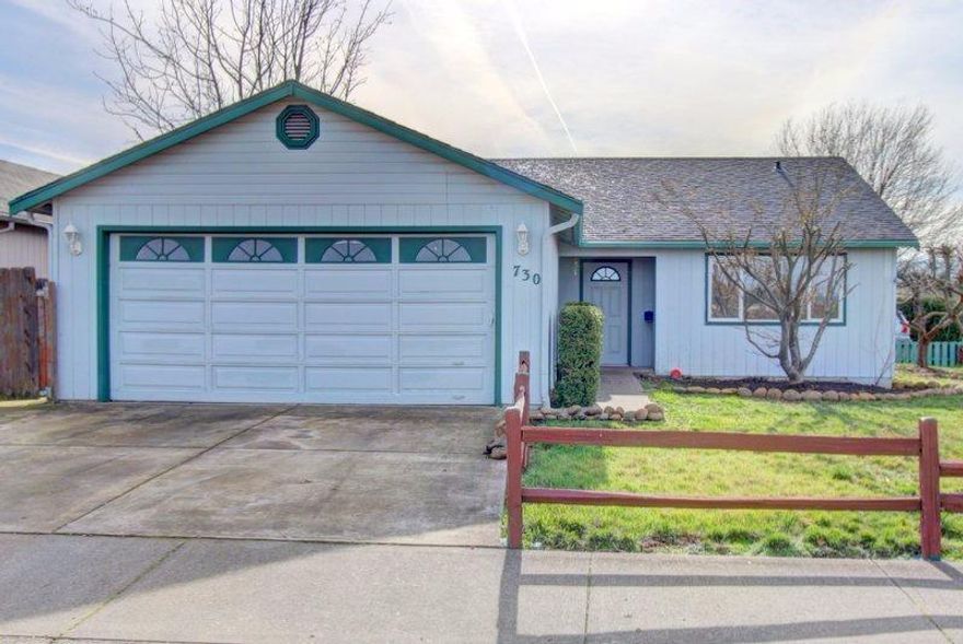 Quality Home in Great Neighborhood, Perfect for First Time Home Buyer or Investor! This home has so much to offer: Newer carpet & vinyl, newer garage door, newer garbage disposal, newer dishwasher, newer interior paint and much more. All appliances stay, including Samsung refrigerator! Boasts forced-air heating & air conditioning, tile countertops in kitchen and baths, living room has vaulted ceilings, plant shelves & ceiling fan. Sliding glass door leads to adorable back yard with raised flower beds. Both the front and backyard have timed sprinklers and gorgeous mature trees. Backyard has large covered back patio and is totally fenced for safety and privacy. Attached 2-car garage with shelving and work bench. This home is perfect for a new family or investors. Tour today!