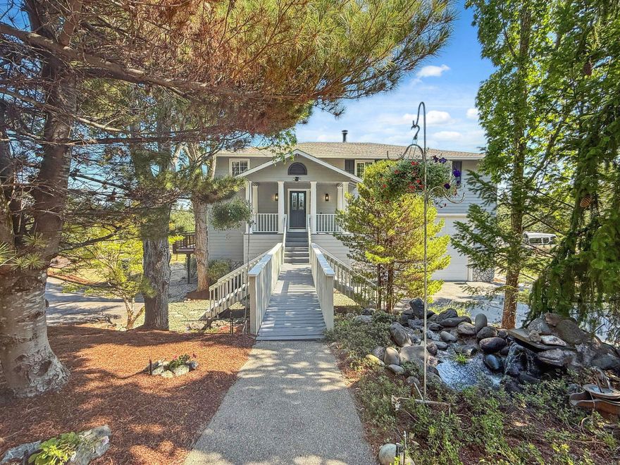 LUXURY RETREAT sweeping mountain & treetop views on 5+/-ac of landscaped privacy feels like 6 bedrooms! Pride radiates throughout showcasing artisan finishes: hand‑carved pecan floor, 12'ceilings w/crown detail, walls of bay & picture windows framing exceptional views. Welcoming water feature hints at what's beyond—a network of 3 ponds, 3 waterfalls & meandering ''creeklets''. Main level lives large: elegant living w/stone fireplace & custom wood mantle; formal dining opens to alfresco deck; kitchen w/stainless appliances, granite counter, moveable prep island, deep double sink; den/office (convertible); spacious primary suite w/view windows, jetted soaking tub, dual sinks & walk‑in closet; 2nd bedroom has private pass-through to office. Daylight level: 2 bdrms, bonus/media rm (convertible), 3rd full bath, laundry, storage. Multi‑tier redwood decks w/spiral staircase descending to fenced backyard. 2car garage w/private office. Rare combo of luxury finish, indoor‑outdoor flow & privacy.