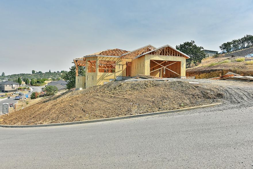 Incredible new construction in highly sought after Bella Vista Heights, within the Hoover School District, & featuring outstanding views with a large covered deck. Custom view home built by McKenzie Custom Homes. This single story luxury home features an open great room floor plan w/gas fireplace & offers 9, 10, & 11' ceilings throughout & an abundant window package designed to take in valley views & provide great natural light within the home. Extensive lighting package includes recessed & LED lighting, w/4 ceiling fans throughout the home. Too many features to list including gas water heater, natural gas patio BBQ outlet, waterproof luxury vinyl wood plank flooring throughout, custom finishes such as granite countertops w/tile backsplash & stainless steel appliances in kitchen, gas range & walk in pantry.  Outstanding master bedroom w/coffered ceilings, views, slider out to deck, & master bath featuring dual vanity, separate shower & soaking tub, water closet, & large walk in closet