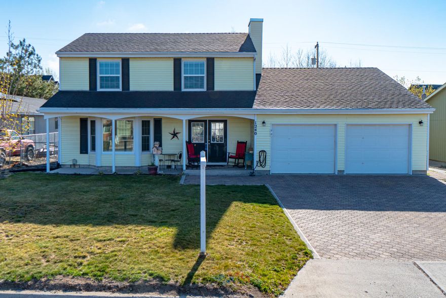 Classic two story home w/dual living spaces centrally located in a mature neighborhood in NE Prineville. Covered front porch is perfect for morning coffee, french doors open into a lg open living space off the tiled entry. Oversized bay windows bring in tons of natural light that spills into the formal dining space. Farmhouse style kitchen w/plenty of cabinet space, portable island, full height tile backsplash, SS appliances, & open shelving. Just off the kitchen is the perfect breakfast nook w/built in bench seating. Family room boasts a modern brick fireplace w/mantle that burns real wood & built in storage cabinets & shelving. Primary bedroom offers dual closets & a built in bench seat, full bath w/step in shwr. 3 add'l bedrooms share a full bath upstairs as well. Outside you'll enjoy the covered paver patio & spacious backyard-perfect for entertaining. Oversized dbl car garage w/opener. New paint, wood look laminate, tile & LVP floors, appliances included - move in ready!