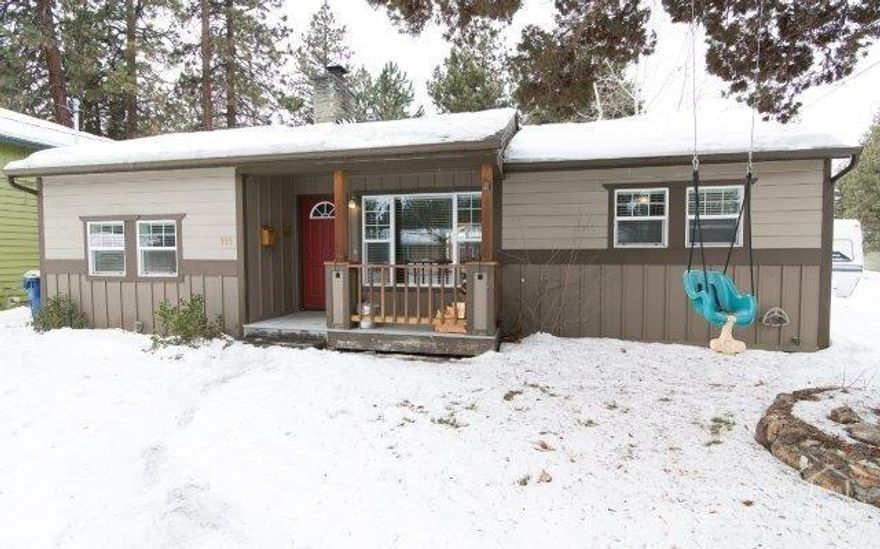 Midtown home on a large lot and an oversized detached two car garage. Recently remodeled, this charming bungalow is on a fenced and landscaped corner lot. Three bedrooms and a family room (the former one car garage was converted), Jotul wood burning insert fireplace in the living room, and located close to parks, schools and shopping. Great home in a great neighborhood in desirable close in Bend!