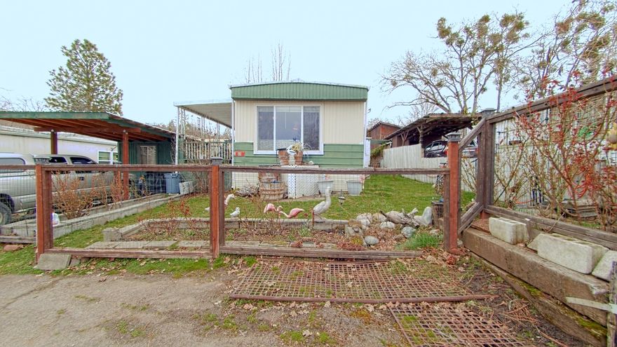 Charming 2 bed, 2 bath manufactured home perfect for downsizing or first-time homebuyers. This cozy residence boasts a comfortable living area, a fully equipped kitchen, and a spacious primary suite with an attached bathroom. The second bedroom is also generously sized and can serve as a guest room or home office. The home is nestled in a quiet community and features a covered carport and additional storage shed. Don't miss out on the opportunity to make this affordable and low-maintenance home yours!