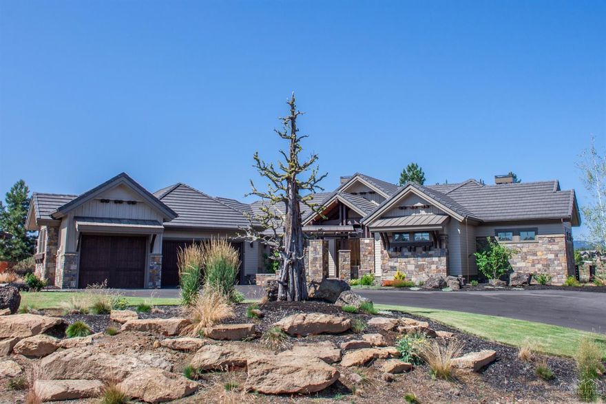 Stunning Cascade views welcome you to this award winning, single level home. 20 ft vaulted ceiling in the great rm with woodburning fp, natural stone, 5.1 surround, knotty alder, maple and walnut accents through out, stunning gourmet kitchen with slab granite and quartz, 2 dishwashers,2 wine fridges, custom cabinetry. Master has mt views, fp, huge custom walk-in closet, silver travertine tile, oversized 3 car garage, beautiful courtyard and covered patio for entertaining.