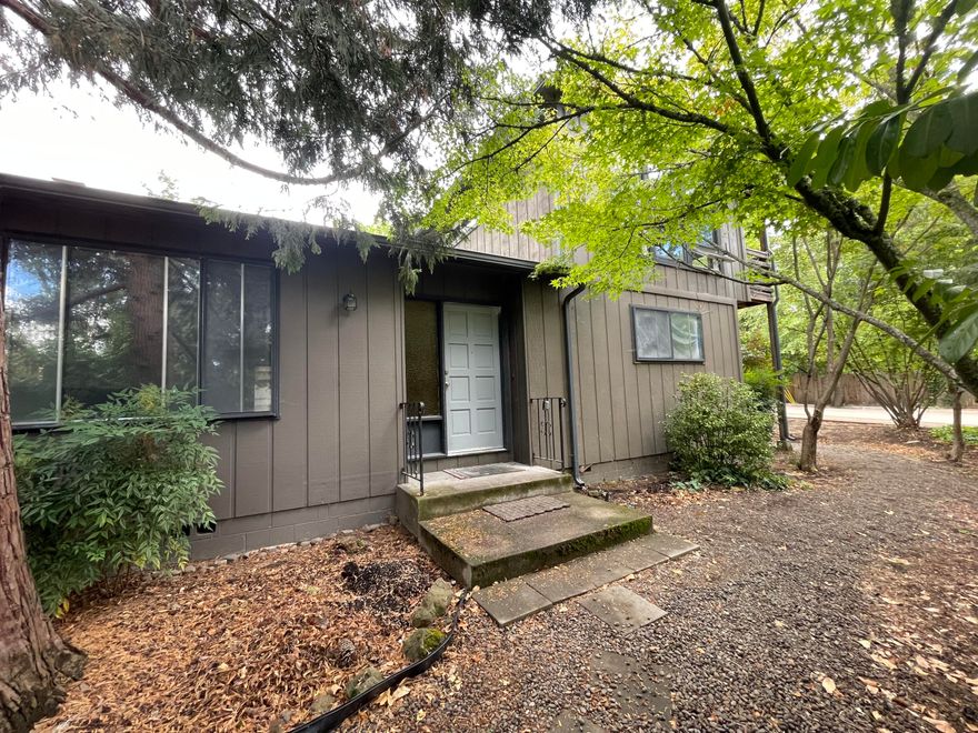 1921 sq ft home with the main living areas on the main level(2 bdrms + bonus room/2bath) with laundry room, 2 car garage. The second story was a bonus room addition that can only be accessed from exterior stairs. This room could be used as a 3rd bedroom or flex space. County classifies the house as 2 story because of the addition and refers to the addition as an art studio. New carpet has been installed in living room, hall, and 2ndary bdrm. New vinyl floor in primary bdrm and fresh interior paint. 

The home has tons of storage with double closets in both bedrooms, double closets in hallway, large closet in 2nd story flex room.