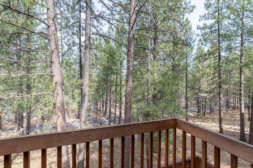 Just a short distance to the SHARC and Village, this is a prime location if you want to be close to all the activities!  Enjoy the Sunriver charm the moment you walk into this home! Vaulted Ceilings with a classic floor to ceiling lava rock wood burning fireplace for those cool days. Wood accented walls throughout. The main level features two bedrooms plus a bathroom. Upstairs are two additional guest bedrooms and a bathroom PLUS a loft area that can easily be used as a 5th sleeping space. Enjoy the second story deck off the loft. Enjoy tile counters in the kitchen and bathrooms. Laminate floors in the main great room. Wrap around deck to enjoy the outdoors! Enclosed hot tub area to enjoy a nice soak after a day of Central Oregon activities! SHARC Paid.  Includes a storage area to the side of the home.