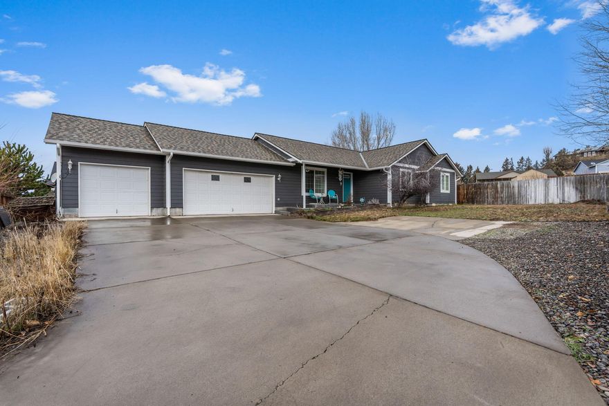 Nice Home in a Great Neighborhood! This charming property welcomes you with an open floor plan that creates a bright and airy atmosphere. The spacious kitchen is a chef's delight, offering plenty of room to prepare delicious meals. With 3 bedrooms and 2 baths, there is ample space for a growing family or guests. The primary suite is a peaceful retreat, complete with a walk-in closet for all your storage needs. The 3-car garage provides plenty of space for vehicles and extra storage. The vaulted ceiling adds a touch of elegance to the home, enhancing its overall appeal. Situated in a fantastic neighborhood, this property is surrounded by desirable amenities, Barnes Butte Trail system, shops, and restaurants. Don't miss this opportunity to own a beautiful home in a sought-after location!