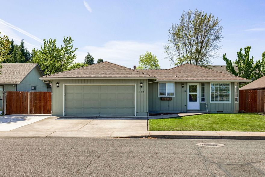 $5000 credit offered to put towards interior upgrades or closing costs for buyer! Quality 3 bedroom, 2 bathroom home in wonderful Central Point Neighborhood sitting on large .17 acre lot with RV Parking. Located near a great park, this home features updated kitchen and flooring! Newer HVAC system, with mini split system for climate controlled garage. Large backyard with patio, shed, and basketball court! Don't miss this one!