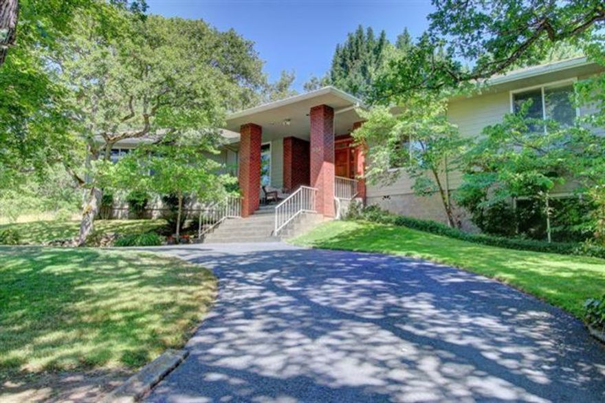 Very desirable Old East Medford setting. Beautifully updated contemporary/craftsman detail in this spacious 4 bedroom home with 3 bedroom suites. Gorgeous hardwood floors throughout with Brazilian Cherry Wood in the master suite. Custom City Scape natural cherry wood cabinets, beautiful quartz counter tops and a professional grade Wolf stove top/range. 4 zone heating & air. Beautiful backyard with hot tub and solar heated pool. Electric solar panels on roof provide most of the electricity for the home. This is a must see for the discerning buyer who appreciates quality craftsmanship and a spacious living space.