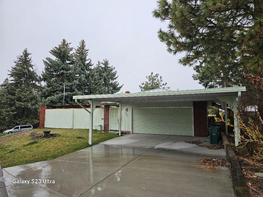 Come see for yourself this great home with updated kitchen, metal roof, low maintenance really pretty yard with mature trees, perfect for natural shade in the summer months. The entrance breezeway with pergola is such a great first impression when you walk in. This home has 2 primary suites with great closet space and good sized bathrooms. Please note the 3rd bedroom doesn't have a window, it does have a nice big closet though! Tons of cabinet space in the kitchen with solid surface counters and pretty cherry cabinets. This one is move in ready and just waiting for you to make it home!