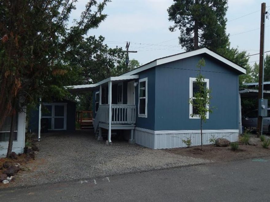 It's BRAND NEW and waiting for its first owner. It's not often that you get to be the first person to live in a home in Bear Creek all-ages park just outside Ashland. This 2015 Fleetwood is the perfect size for one or two as a vacation home or settle in all year. High ceilings, an open floor plan and big windows make this cozy home feel much bigger. The bedroom is in the back of the home and takes advantage of the views. The home comes with an underground sprinkler system, carport, storage shed and a fabulous back deck that overlooks the park's open space. It is a private and peaceful outdoor room. This home is so new that taxes indicated on the listing information are an estimate only since they have not yet been determined.