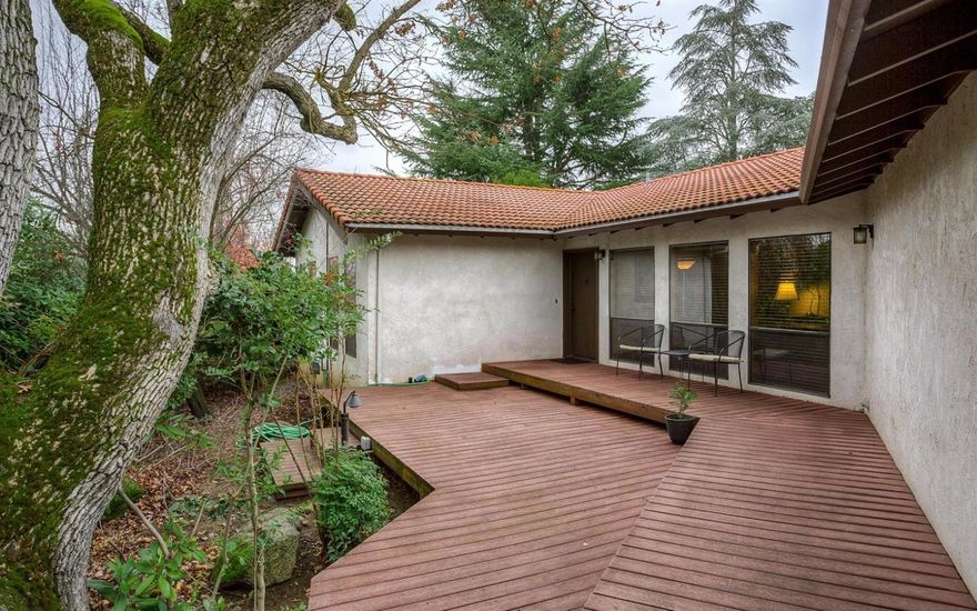 This house might withstand it all; fire, flood, hurricane, and even the most destructive of natural forces...children. With walls poured from solid concrete, this one of a kind home withstands wear and tear as well as keeping out sound, and the most extreme of weather. While the walls are made of concrete, they don't look it and the home maintains a warm and inviting feel. Semi-open floorplan provides with a living room, dining room and informal dining off the kitchen. Large master suite is one of 3 bedrooms, in addition to an office. The spacious back yard includes two sheds and a well built play structure and provides excellent privacy. Another bonus is that this wonderful home sits on a dead end street. For the tinkerer there is a spacious two car garage with work benches on either side. New furnace installed recently to keep this castle nice and warm during winter.