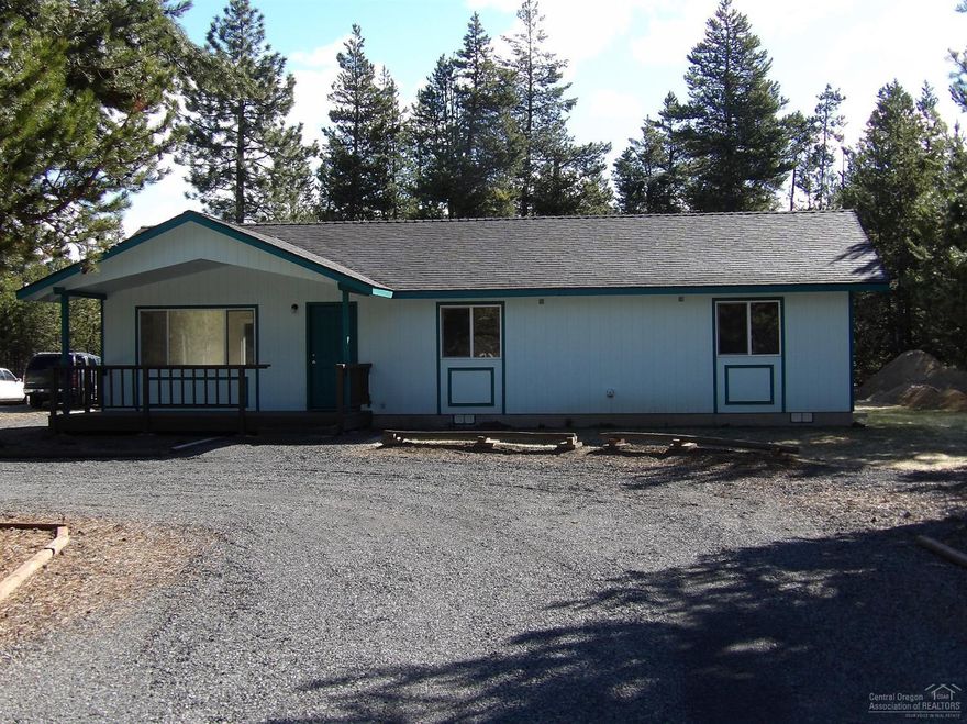 Cute 3 bedroom/2 bathroom 1152 sq.ft. home ready to move into on a nicely treed .5 acre lot. New carpet. New Whirlpool appliances. Fresh paint. Brand new composition roof. Covered front porch. Circular driveway. Property backs up to Thousand Trails for privacy. Super Good Cents home designed for higher energy efficiency. 120 sq.ft. storage shed in the backyard. Property corners have been marked. Plenty of room to park an RV or build a shop/garage. Come enjoy Central Oregon, hiking, rivers, mountains.