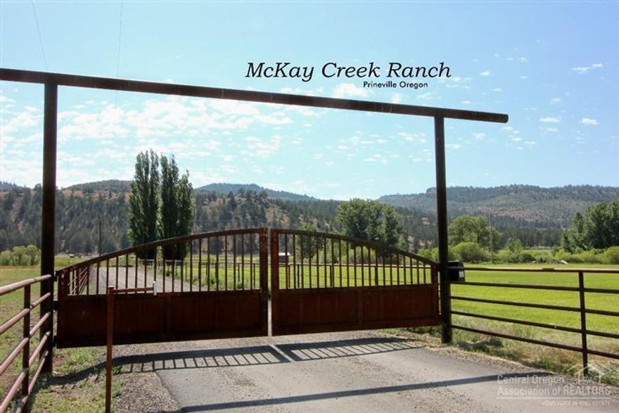 399ac McKay Creek Ranch w/92+ Irrigated. McKay Creek runs thru the property w/custom built home that is a stunning show piece. 3,841SF w/ 4 beds & 3.5 baths. Master suite on main level, 2 offices & bonus rm. 96X40 6 Stall Barn w/tack rm, laundry, bath & wash rack. Multiple trailer hook ups. 200X350 Outdoor arena w/ holding pens, 1/2 Mile Track, 6 irrigated paddocks. Several pastures. Fenced & cross fenced. 3 Tower pivot & some K-Line irrigation. Guest qrtrs, add'l barn, shop & 40X120 hay barn. Much more
