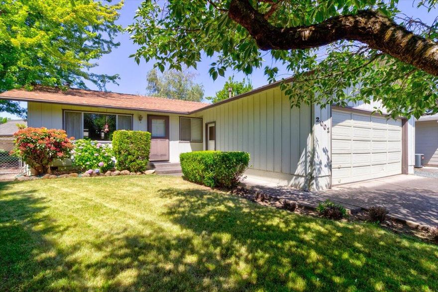 Great first time buyer or investor opportunity in an ideal location! Come take a look at this charming 3 bedroom 2 bath home nestled on a quiet street in East Medford. This home has been lovingly cared for & ready for proud new owners to update it to their liking! You'll love the peaceful & fully fenced backyard w/ mature foliage & plenty of space for a lush garden.  The floorplan makes a great use of the square footage w/ a spacious master + ensuite & lots of built in storage. Attached 2 car garage & Conveniently located within a short distance from Wilson Elementary, medical and shopping. Don't miss out on this East Medford Gem!