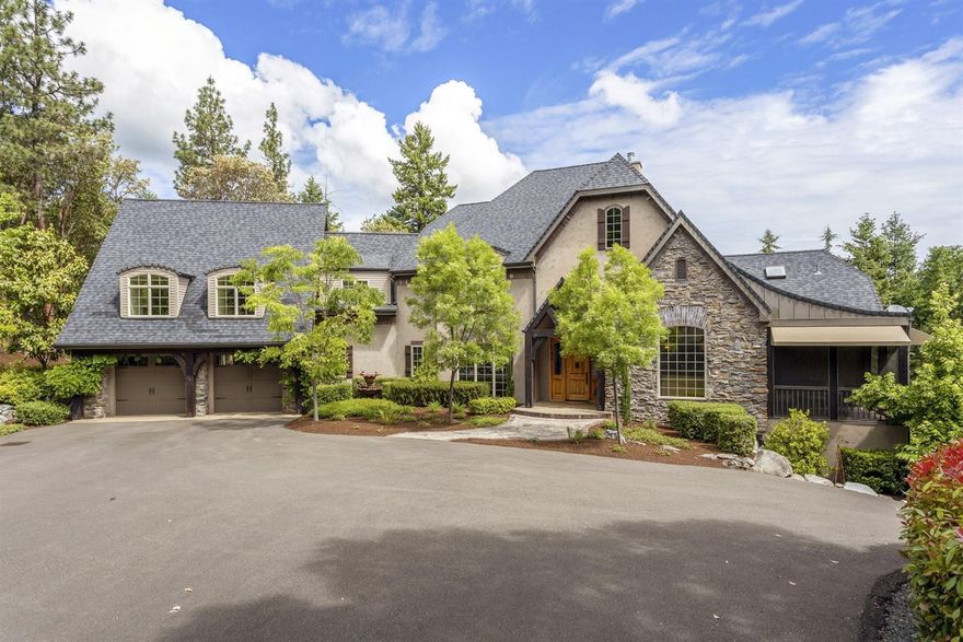 Jacksonville's finest estate! Stunning French country custom home. Beautifully designed floor plan with exceptional craftsmanship throughout. End of the road gated privacy just outside city limits with unmatched views of the valley. With over 4,800 sq/ft of living space this 5.11 acre estate home includes old world style interior beams, massive stone fireplace, chef's dream kitchen with Sub-Zero refrigerator, Wolf cook-top, Thermador convection double wall ovens, Asko dishwasher, granite counters, large island and central vac. Main floor master suite is perfectly designed with large view windows, vaulted ceilings and large walk-in closets. Master bath includes walk-in tile shower and soaking tub w/ views. The elegance continues in the upper level with a spacious living area. Lower level includes a gym with heat and A/C, and over-sized 4-car garage. Well ties to 2 holding tanks totaling 4,000 gallons. Contact listing agent to request a complete package of all amenities and improvement.