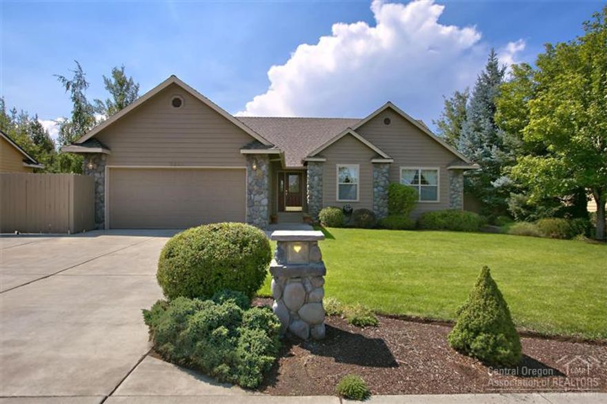 Pride of ownership is apparent from the moment you pull up to this beautiful Oak Tree home! This home boasts open light and bright floor plan with high vaulted ceilings, new hickory flooring, a nice breakfast nook as well as a formal dining area and large master suite with master bath. Outside enjoy the large back deck complete with a jacuzzi, storage building, beautifully landscaped yard & RV parking. Close to hospital, shopping and all that Bend has to offer. Won't last long at this price!