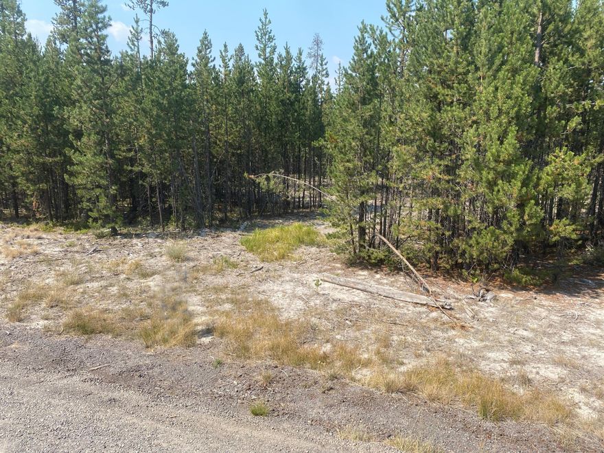 Beautiful .51 acre lot with easy access to the Deschutes River for floating and kayaking. Very sought after area! Quick commute to Bend, Sunriver, Mt. Bachelor and the Cascade lakes.