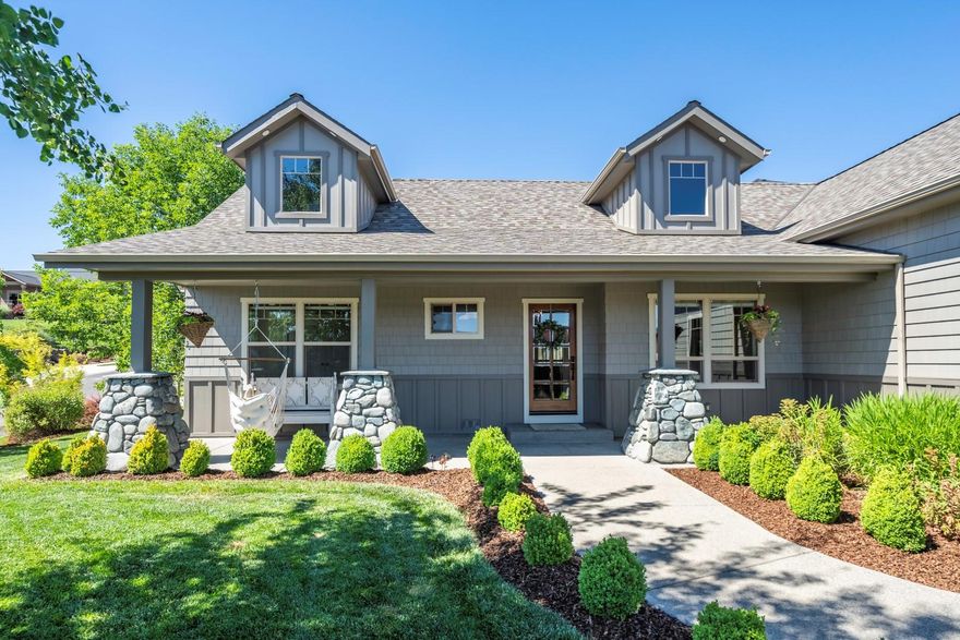 Builder's home; well-built & cared for. .27-acre corner lot, attached oversized 2 car garage, & detached garage/shop w/extra storage. Wood garage doors, sink, hot water valve for washing cars/pets & plenty of off-street parking. New exterior paint, entire exterior is concrete siding & trim. Covered front porch, custom stone masonry columns & exposed aggregate flatwork. Open & split floor plan, new designer lighting, vaulted ceilings, solid oak hardwood floors, gas rock fireplace w/built-ins. Jenn-Air oil rubbed bronze appliances; double convection ovens, gas cooktop, hood, fridge. Tile backsplash, granite counters, cabinet pantry, large island w/ eat-in bar. Master has new carpet, coffered ceiling, walk-in closet, & french doors to the backyard. Master bath has huge walk-in shower, dual showerheads, rock floor, jet tub, dual sinks, & linen storage. Large bonus room can be 4th bedroom w/abundant storage. Breathtaking valley views, large backyard, wrought iron fencing & gated dog run.