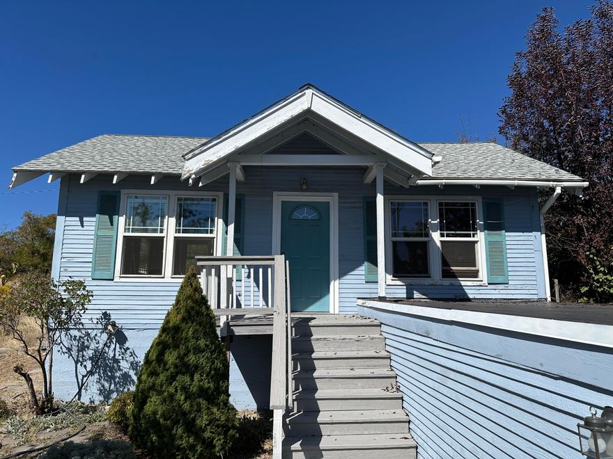 Chic 1935 Bungalow is nicely upgraded and is in good condition.  Great natural light and view from living room.  Kitchen features stainless 5 burner gas stove and dining area. Private fenced backyard.  Downstairs entry from garage into spacious family room, 1/2 bath, laundry area and storage.  Bedroom features impressive built-in storage and attached bath with clawfoot tub.  Convenient to downtown, OIT and hospital.