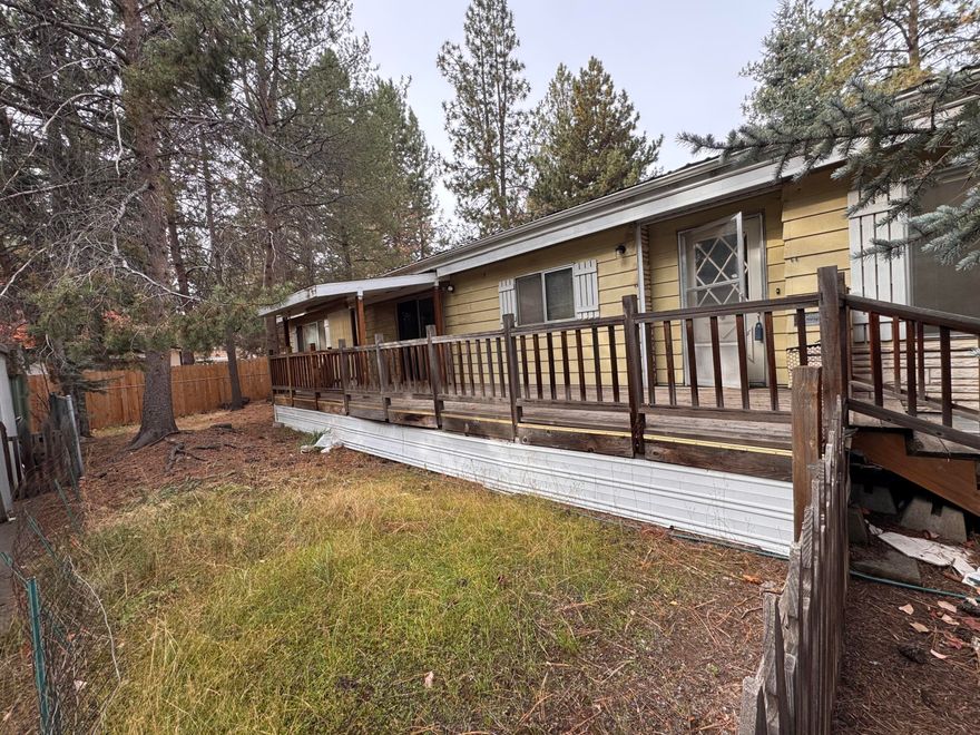 A diamond in the rough with endless potential! Set on an oversized lot, this 1973 manufactured home offers a surprisingly spacious living room, two-car carport, and plenty of room to reimagine and refresh. Move in now and transform over time-your next stylish project awaits!