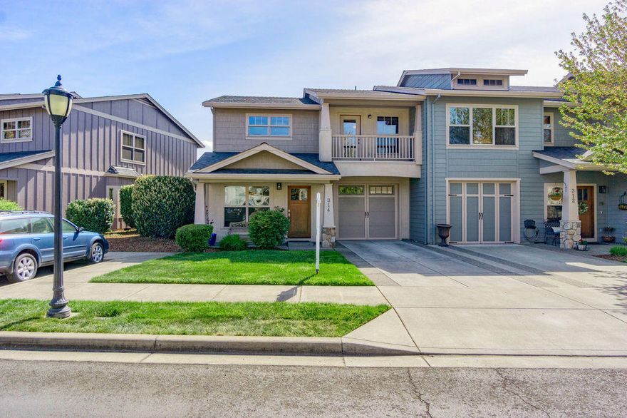 Don't miss this your opportunity to own this end unit with vaulted ceilings, fenced backyard, covered patio and high windows with southern views, at 1915 sq ft, this is the largest floorplan offered in this townhouse community.  Nice landscaping, large kitchen with granite counters & nice appliances, deep pantry cabinet & eating bar, the kitchen opens to the dining and living room. Hardwood floors in entry & kitchen. Main floor master suite with lg shower & 2 closets. 2 additional lg bedrooms + a bonus/family room & full bath are located on the 2nd level. Oversized finished 1 car garage + 2 parking spaces located next to this unit.  Existing refrigerator, washer and dryer are included. Located in a wonderful eastside neighborhood, the association also includes, use of the in ground pool, a club house, tennis courts, common areas and exercise room. Front and back yard maintenance is included.