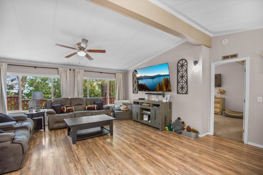 Updated Home on Nearly 10 Acres with Valley Views, with recent road work to make for a smooth drive home!

Welcome to 300 Arrowhead Pass in Jacksonville—a rare opportunity to own an updated 3-bedroom, 2-bath manufactured home on 9.87 acres with sweeping valley views. This property offers the perfect blend of comfort, functionality, and wide-open space. The home features 1,512 sq ft of living space with thoughtful updates throughout. Outside, you'll find a 1,500 sq ft shop/dirt floor—ideal for hobbies, storage, or business use—plus RV hookups for convenience. A charming she shed on a foundation provides the perfect retreat, studio, or workspace. With nearly 10 acres to call your own, you'll enjoy privacy, stunning vistas, and plenty of room to live the lifestyle you've been dreaming of.  Possible owner carry.