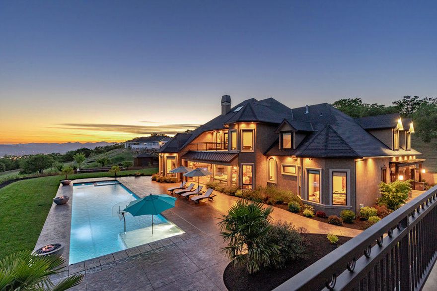 Experience the ultimate & gorgeous, custom Pagnini built home. Situated on 5.54 acres of Southern exposure & beautiful views. Nestled behind a private gated entry this estate includes a 6-car garage w/ 1604 sq ft guest quarters, in-ground pool/spa & basketball court. The exquisite home offers beautiful custom finishes w/ high beamed ceilings, unique wood finishes, lots of built-ins, grand windows, gorgeous flooring & a French country kitchen w/high-end appliances & custom finishes throughout. Escape to a grand main level Master Suite w/sitting room & spa features incl steam shower, dual heated floors, free standing tub, 2 closets, & gorgeous tiles. Additional bedrooms w/walk-in closets & full baths are located on the 2nd level. Work from a home office offering soaring grand ceilings & warm luxurious wood finished and cabinets. Entertain in the dining/family room w/ lg stone fireplace, or choose the formal dining rm, game room, or lg. bonus room. The setting is private & inclusive.