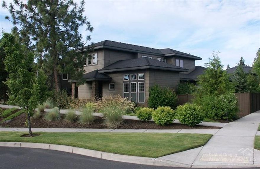 Uniquely set back from the street. Quality Renaissance contemporary cottage. Sold by the original owners. Cabinetry and finish upgrades. Wonderful proximity to the subdivision's Central Park and pool. Soaring living room opens on to the professionally landscaped patio offering privacy and open sky resulting from the corner lot location. Main floor master plus three other bedrooms, two up. Extra bedroom down stairs used as an office. Three full bathrooms. Loft-like family room up. 2995 sq. ft. A/C.