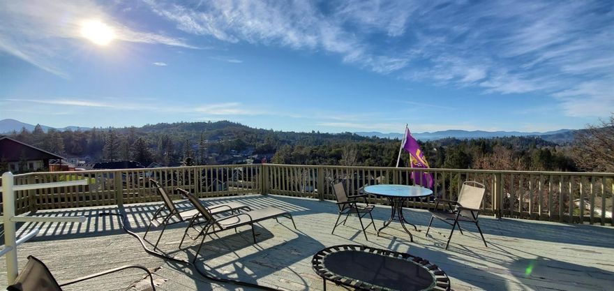 Wow! Looking for views and low maintenance living and a beutiful home? Panoramic estates is just for you. Just minutes from everything Grants Pass is this rural retreat with all the modern amenities. Family room and large open kitchen with living room that opens up to your Panoramic view and huge deck! Kitchen is amazing with entertaining this house is perfect! Lots of windows and this house has two master suites with bathrooms so perfect for a 2 family setup or caretaker. All living area on main floor with extra master suite above. Extra parking areas and all paved. Simple living with wonderful views. All info deemed accurate but not guaranteed and subject to change at anytime.