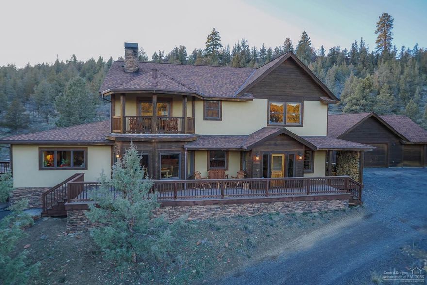 Remarkable Sister's area retreat. Craftsmanship and detail are showcased in this large two level custom home complete with 6 bedrooms plus an office. Take your pick of two master suites, one on each floor. Spacious entertainers kitchen and a massive great room make it a perfect place for large family gatherings. Situated on a private and low maintenance 13 acres- perfect for those looking to escape the bustle yet convenient enough for a quick trip into the nearby town of Sisters. Watch the sunrise from your private second floor master-bed balcony. This home was thoughtfully constructed to maximize energy conservation- from ultra efficient walls to a high end, zoned forced air heating and cooling system. The ornate and efficient wood fired Masonry Heater adds wood-stove type comfort and a unique Central Oregon style ambiance. The detached, 3 car garage provides space for cars, projects or recreation equipment. Call your favorite agent today to schedule a showing!<br>