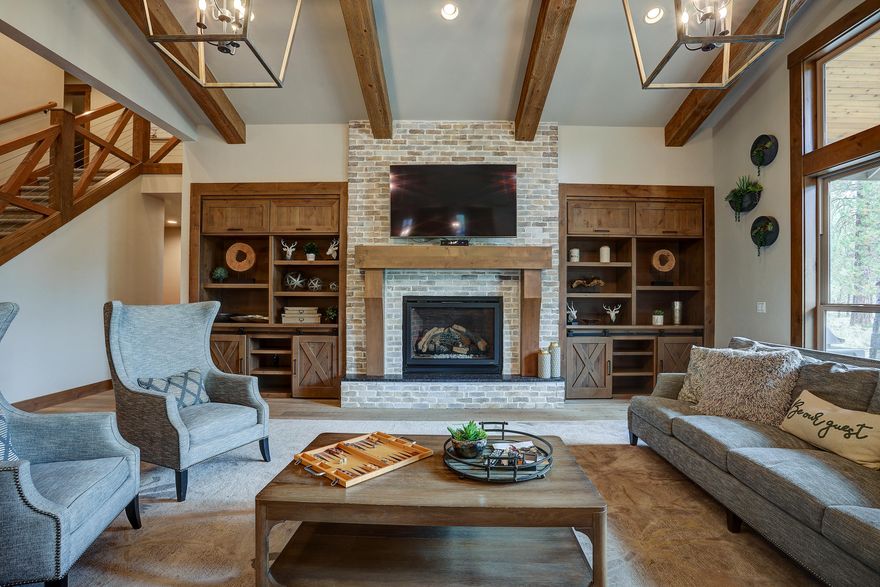 Amazing home in coveted Caldera Springs community.  This luxurious home features an open floor plan with quality finishes; gourmet kitchen that includes a heated kitchen island, perfect for family/friend gatherings, 2 dishwashers offers easy cleanup.  6 spacious master suites, 4 on main level, plus bonus/bunk room. Beautiful landscaping with natural stone accents and patio pavers. Utility room offers 2 Washer/Dryer units. Be sure to check out Visual Tour of home.