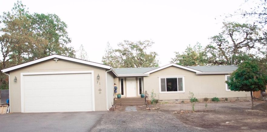 Rare find in Shady Cove! This Move in ready home sits on almost three quarters of an acre and is located in a very private neighborhood at the end of Riverview Circle. With an open floor plan and 1755 sqft, this home has the room for a family and the coziness for just two people. Open kitchen with island and bar, jetted tub in the master bath, lots of natural light throughout the house and much more. Oversized 2 car garage and brand new detached metal RV carport give you all the storage you need. Thousands of dollars in gravel, fencing, and landscape. This house will give you nothing to complain about! Come tour for yourself before it is gone.