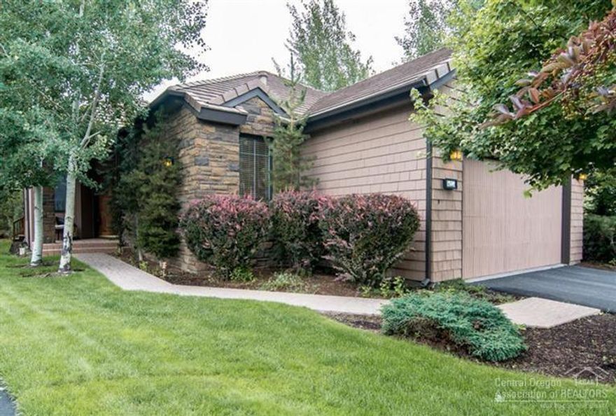 Hard to find single level home in Broken Top! This gorgeous home features an incredibly private setting backing to a pond with a beautiful waterfall. Multi-level decks overlook the peaceful pond. In addition to multi-level decking you will find a private paver patio courtyard with mature landscaping surrounding. Fantastic floor plan featuring soaring ceilings, huge windows, hardwood floors, stainless steel appliances, granite kitchen, surround sound and the master suite separated from the other bedrooms.